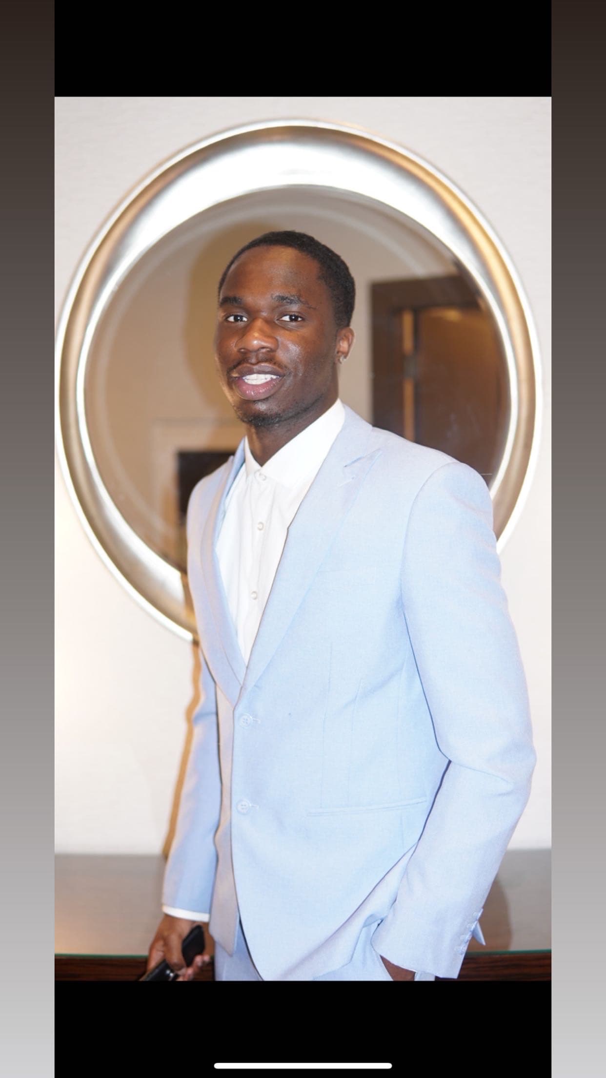 Portrait of Deji Ajayi